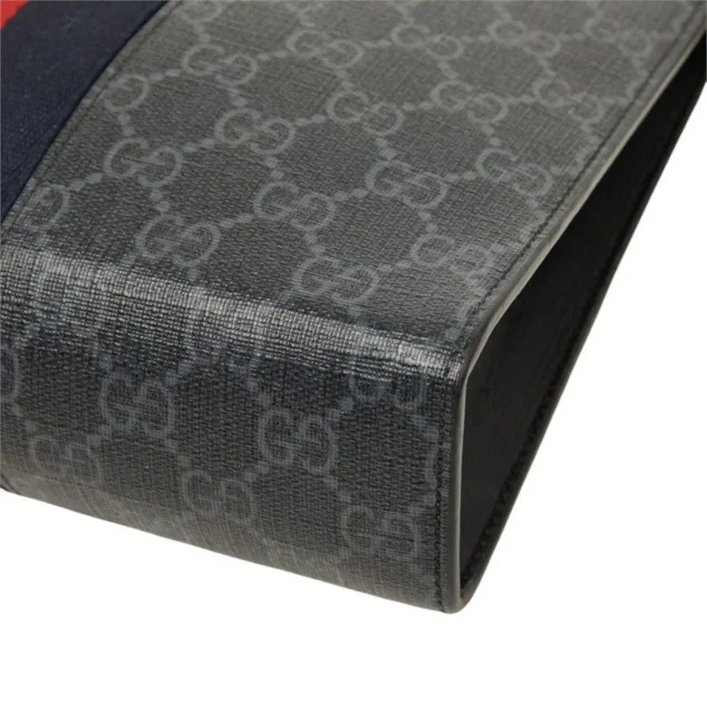 Gucci GG Supreme Clutch Bag